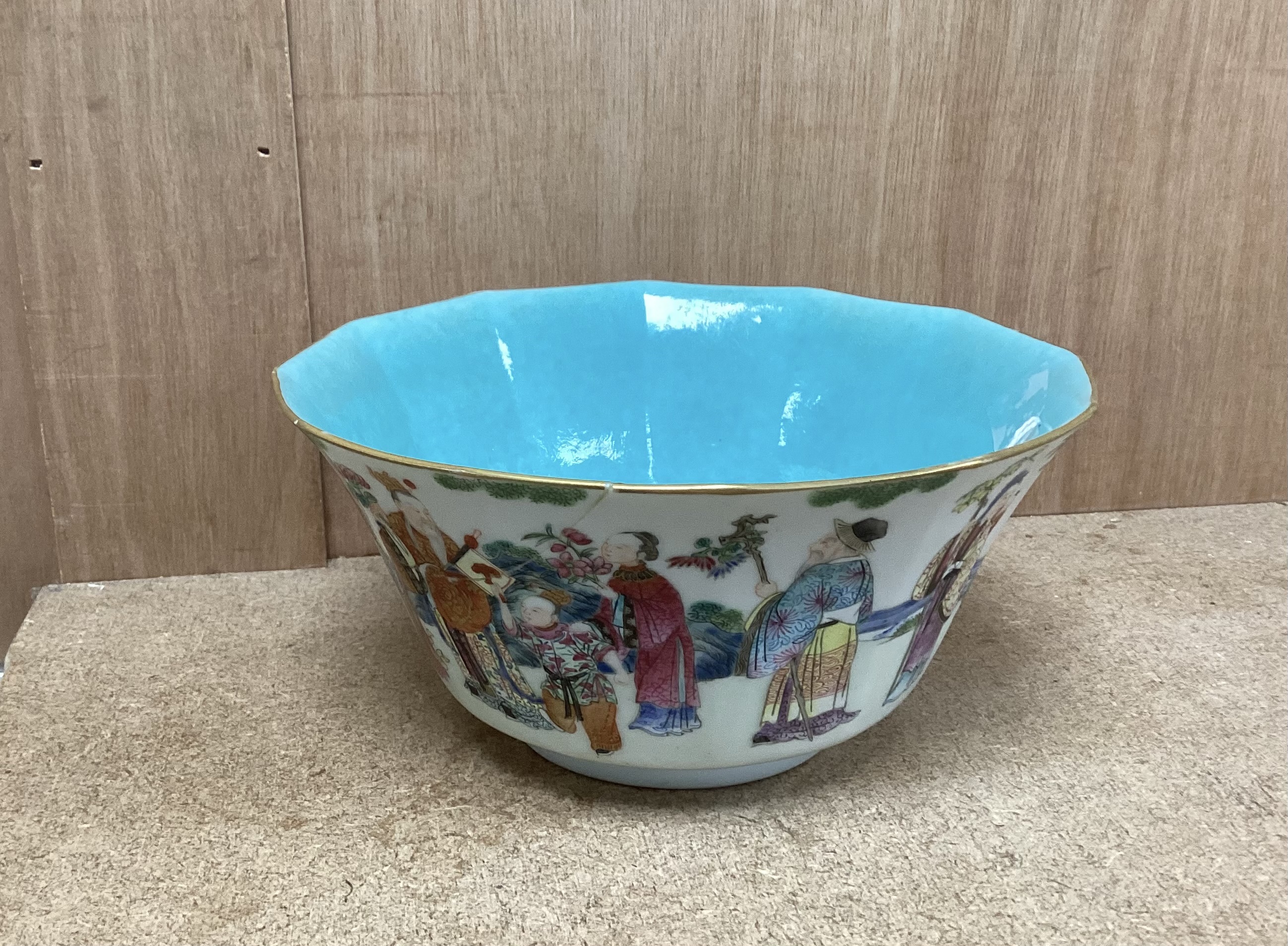 A Chinese famille rose bowl, Daoguang seal mark and of the period (1821-50), painted with famous historical and mythical figures, 18cm diameter (a.f.)